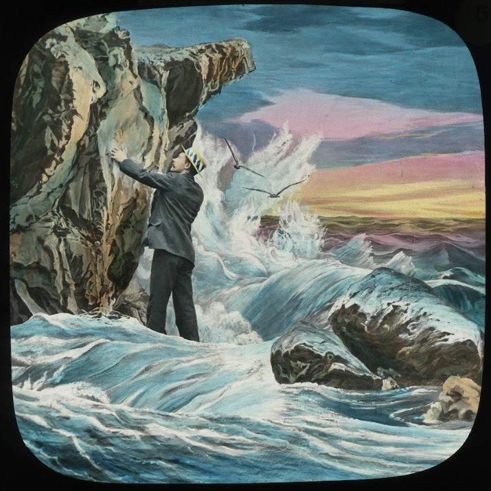 man next to rocks