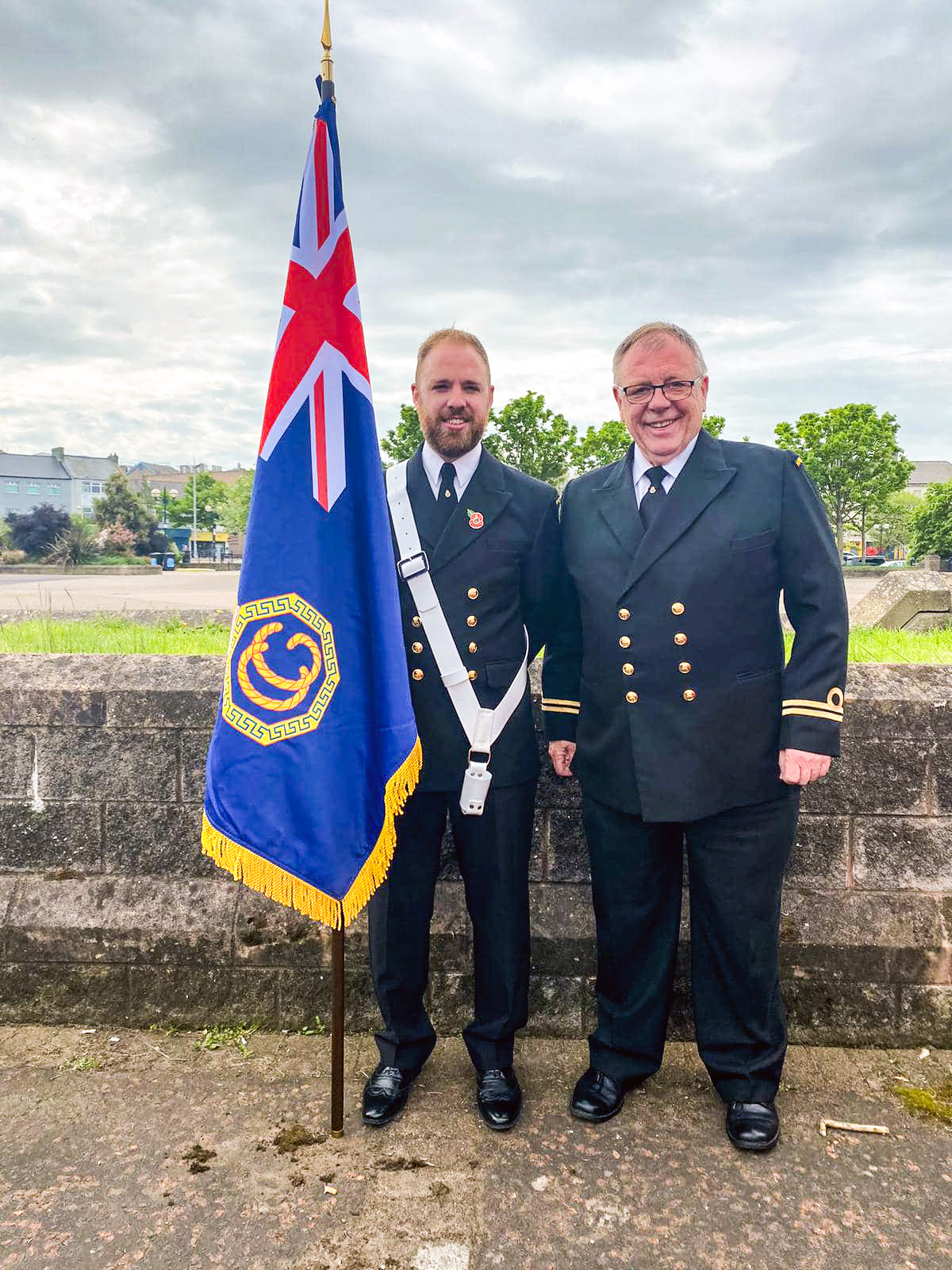 Norman, right, at a Remembrance Day memorial event with his son Steven, Station Officer at Kilkeel Coastguard Rescue Team