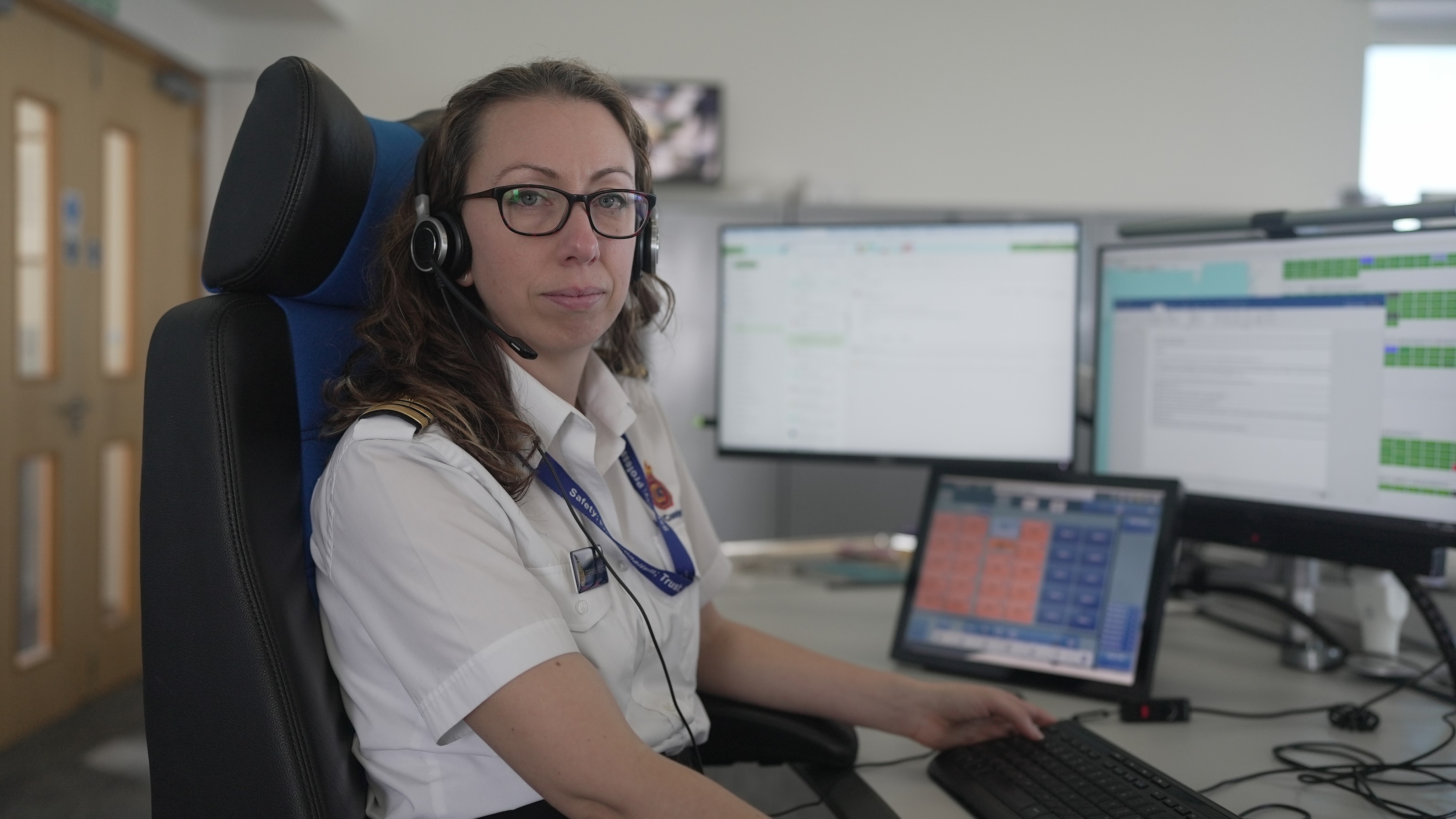 Stephanie George, Team Leader at Holyhead Maritime Rescue Coordination Centre, working at their desk