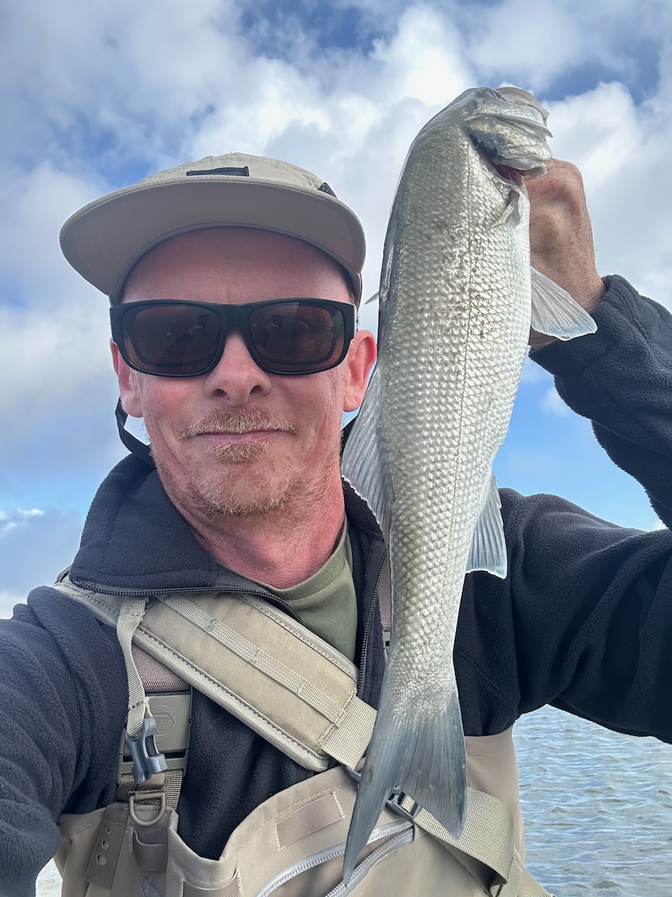 Ben Lovell holding a fish