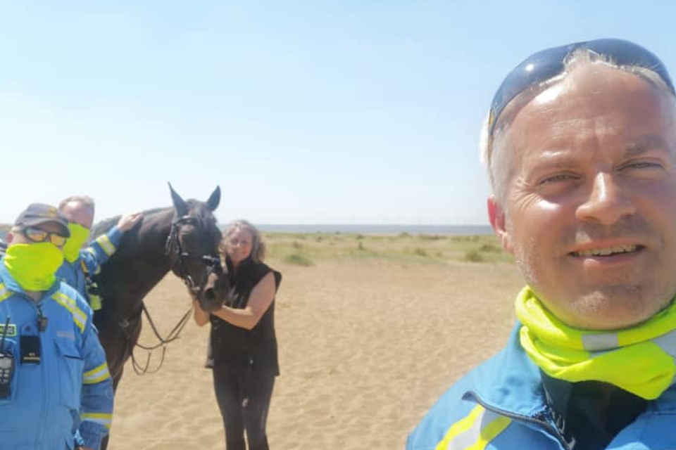 Coastguard helping a lost horse on Skegness beach