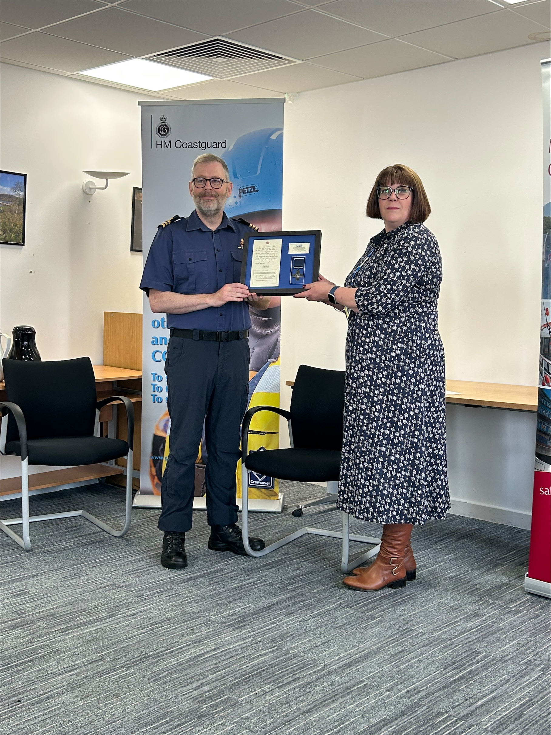Coastal Operations Area Commander Murdo Macaulay and NHS Western Isles Chief Operating Officer Frances Robertson