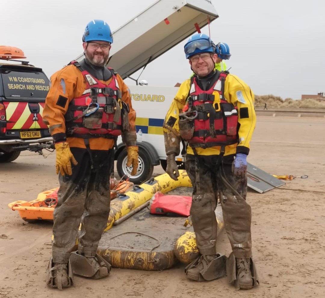 Damien and Phillip during a mud exercise on Crosby Beach