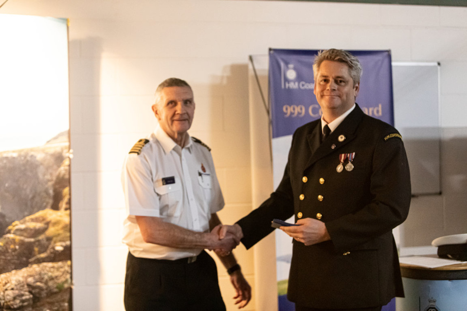 Peter Leonard receives his medal