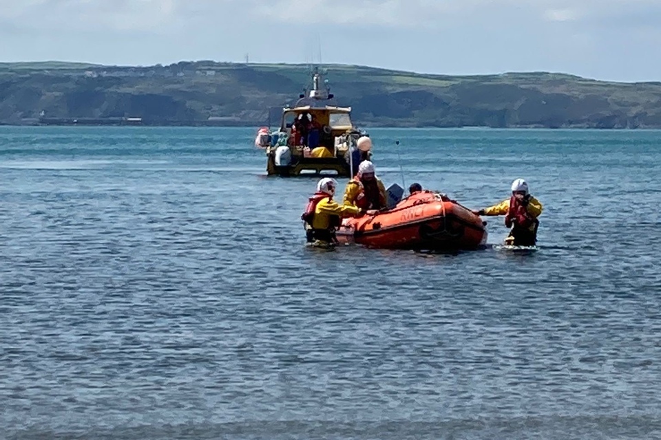 Conditions looked calm from the shore, Michael said, but were much gustier when on the water
