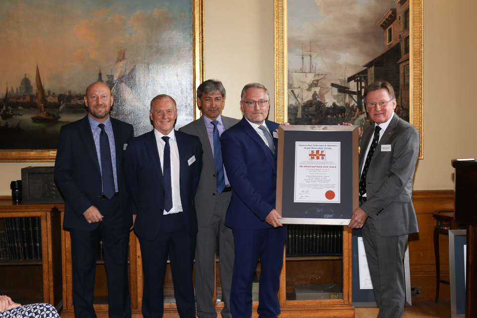 The 2022 Edward and Maisie Lewis award recipients at the Shipwrecked Mariners' Society annual Skill & Gallantry Awards - once again the crew of the HM Coastguard Newquay helicopter, being presented with the award by Captain Ian McNaught, Deputy Master of Trinity House