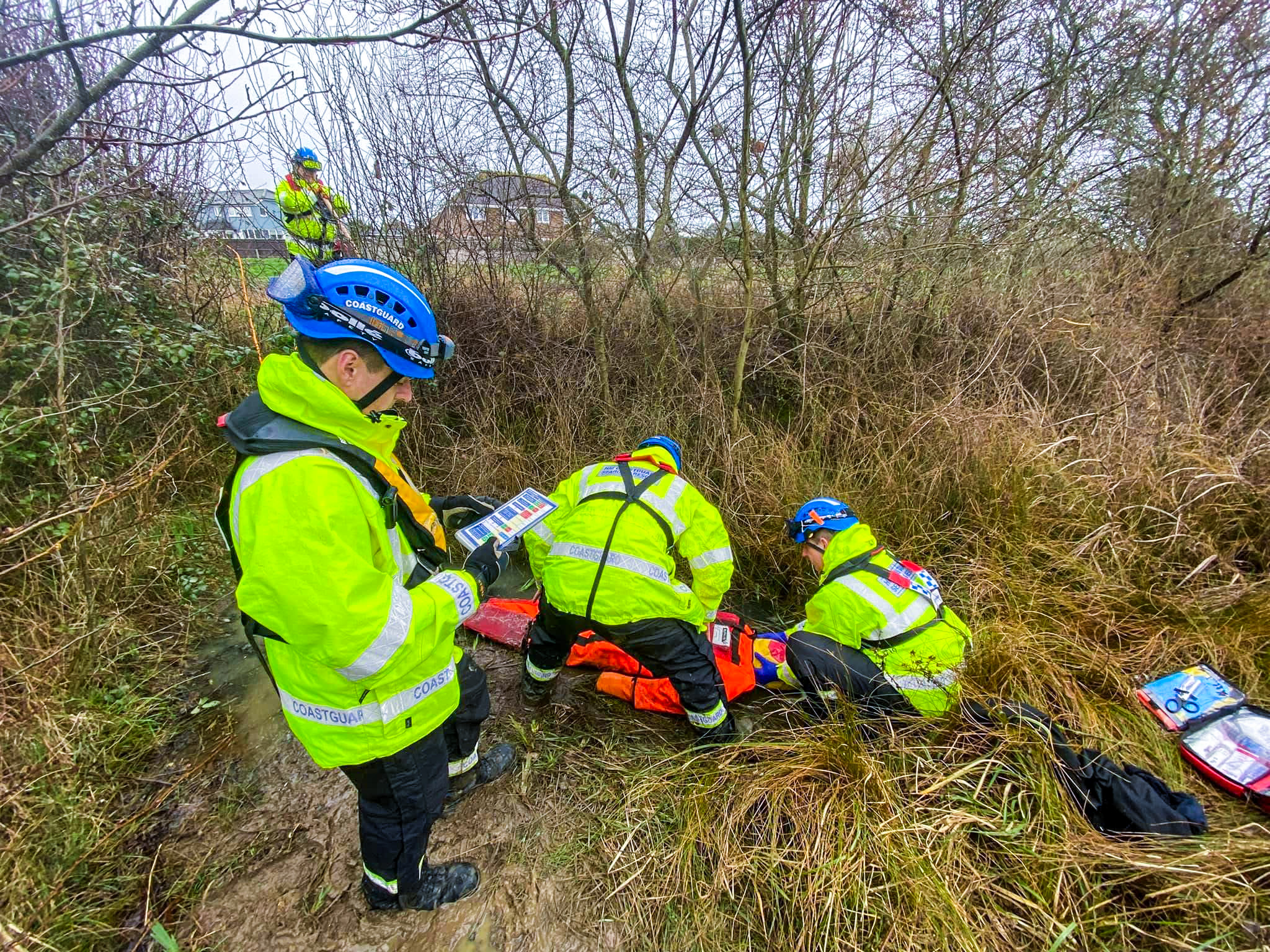 Coastguard Rescue Officers take part in a casualty care exercise. 
