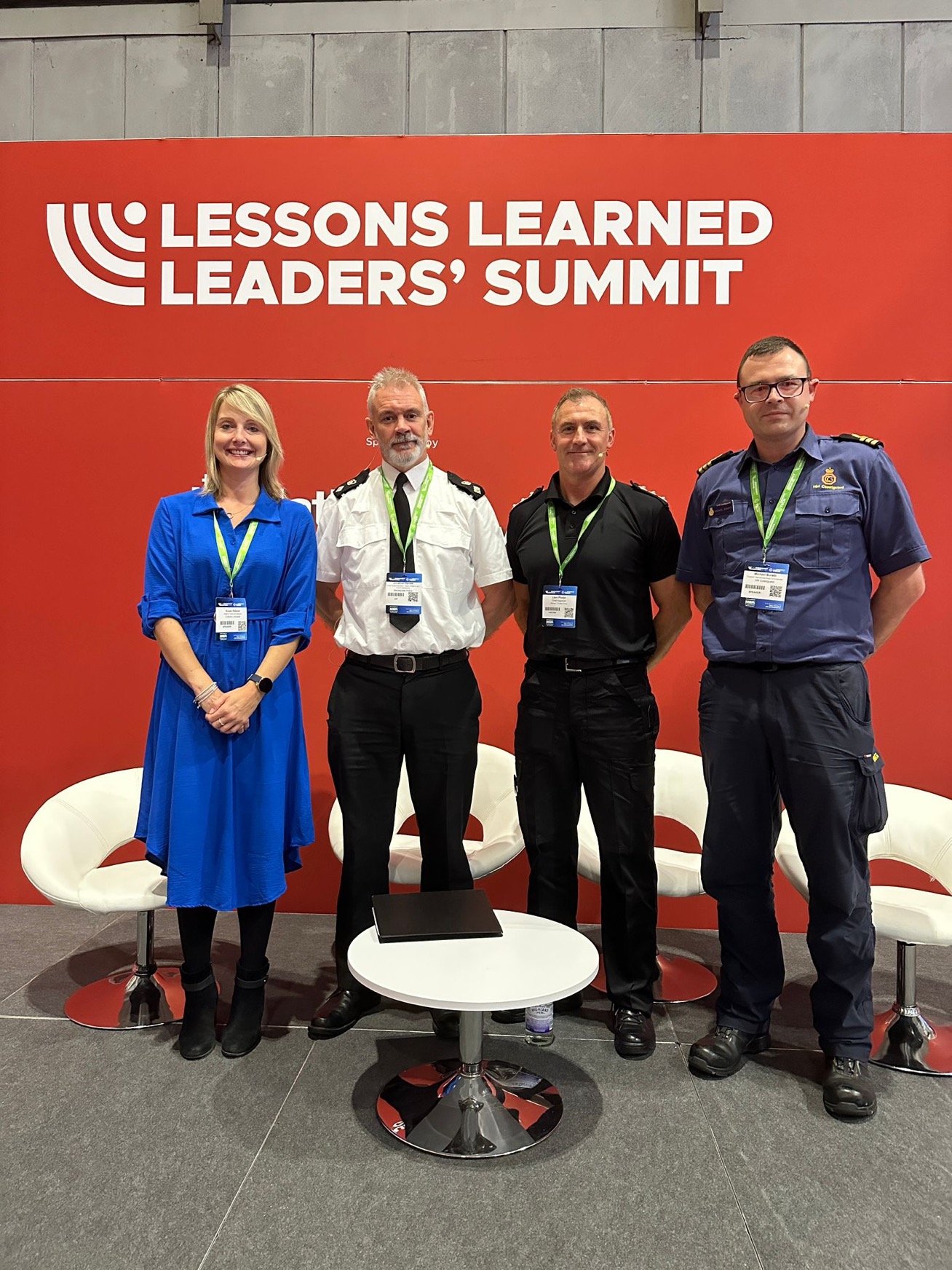Mike Buratti with male representatives from fire and police with female convener