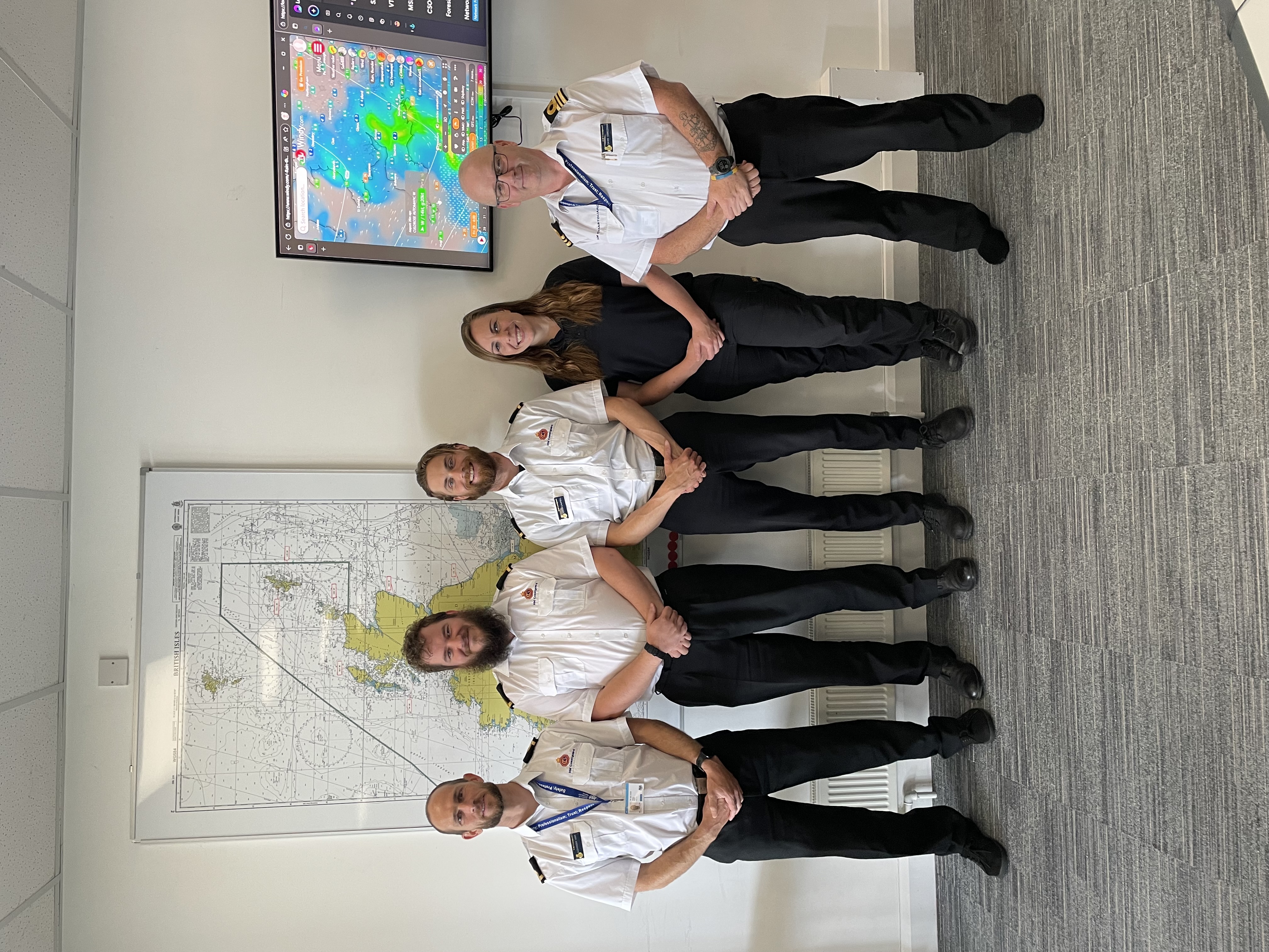 The team on duty at Falmouth MRCC. From left to right: Alex Hart, Alex Lamb, Aeron Campbell, Emily Trapnell and Team Leader David ''Paddy'' Corcoran