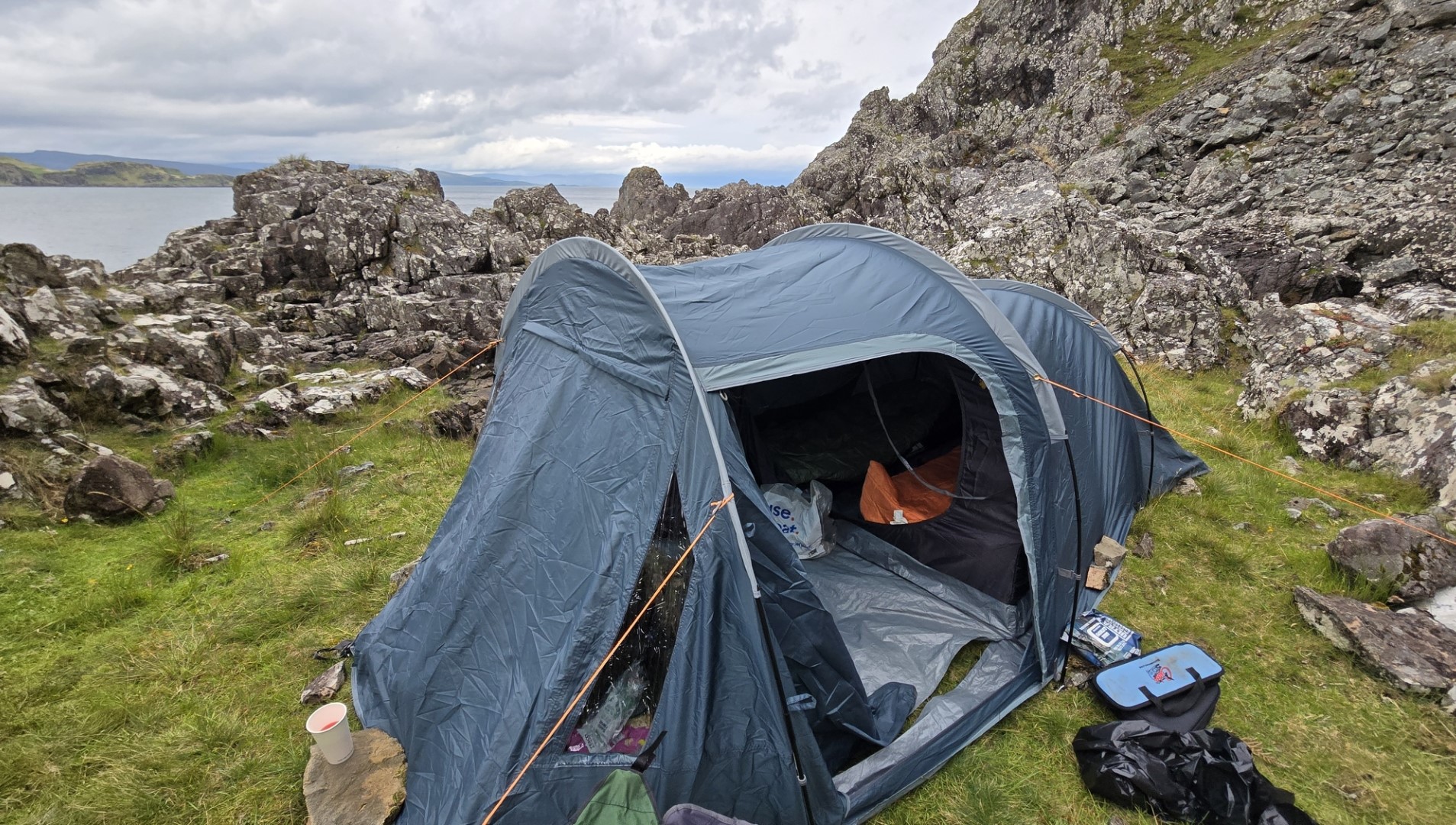 The tent the anglers' stayed in overnight, pitched on grass between rocks