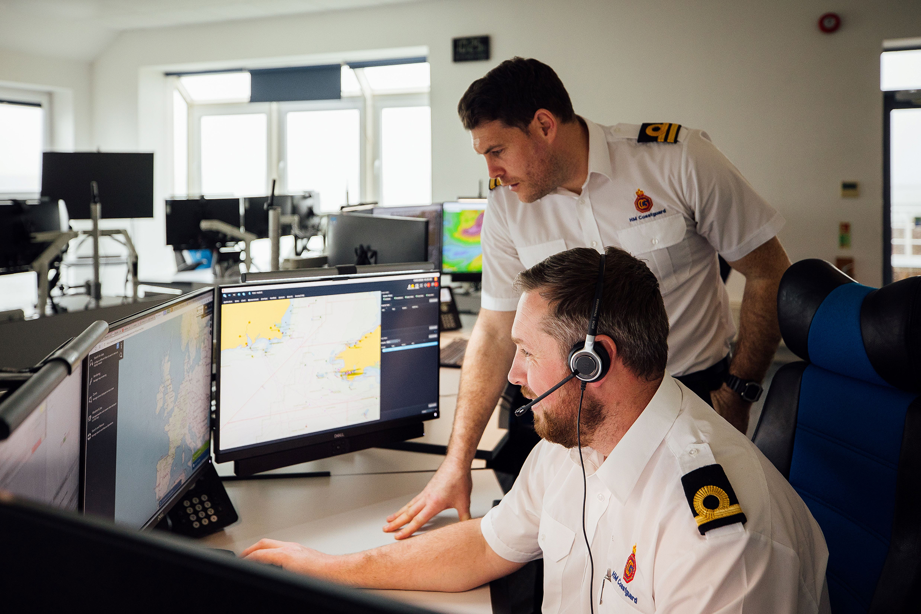 Matt (front) and Pete in the Milford Haven Maritime Rescue Coordination Centre. It is one of 10 centres around the UK in addition to the Joint Rescue Coordination Centre based in Hampshire.