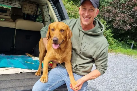 A delighted Rowan is reunited with his beloved pooch Rufus