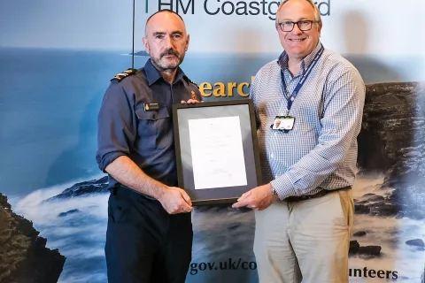 Alan Stewart receiving his award from Brian Johnson CEO