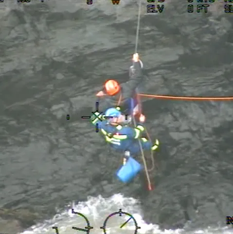 Coastguards rescue a man from rocks at Newquay