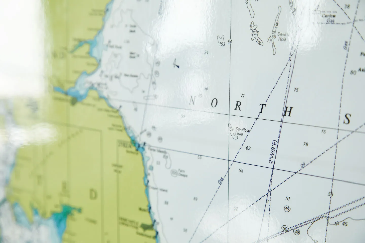 Map showing part of the UK land mass and North Sea mounted on a wall