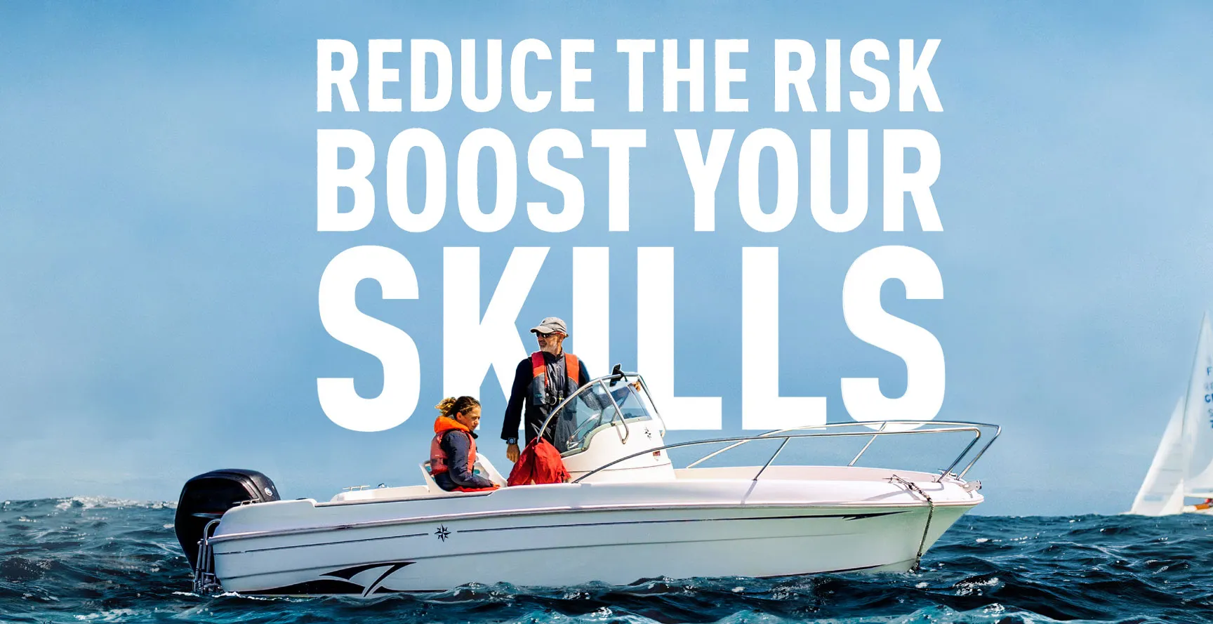 A man on a small white boat against blue skies. In the background sailing ships can be seen. Text reads 'reduce the risk boost your skills'