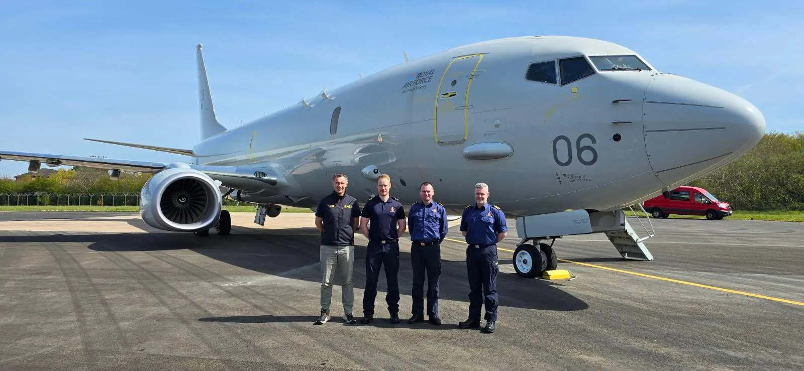 Standing in front of an RAF P8 Poseidon aircraft are,m from left, Phillip Johnston, RNLI Area Operations Manager; Andrew Oldfield, Rescue Coordination Centre Manager, Belfast; Ryan Gray, Senior Coastal Operations Officer; Gordon McCreadie, Divisional Commander