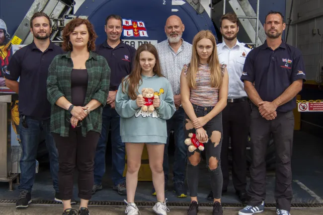 Mum Milena, Elsie and Mabel with their rescuers.
