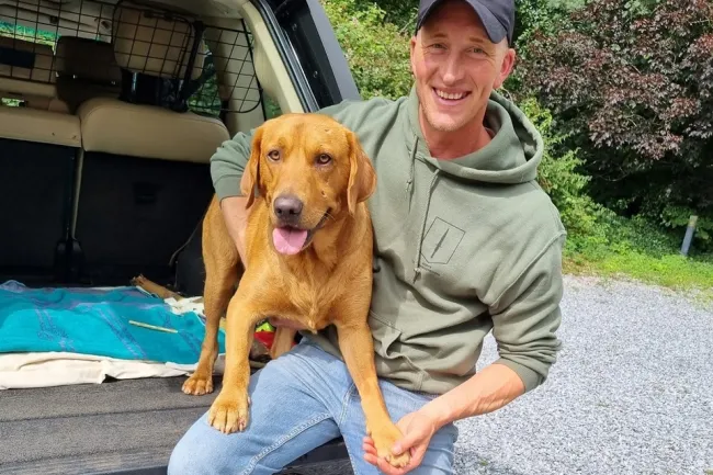 A delighted Rowan is reunited with his beloved pooch Rufus