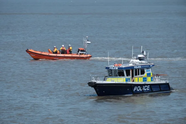 RNLI and police boat on the River Thames