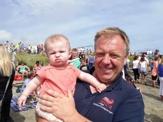 Kilkeel Deputy Station Officer Norman Bridges with his granddaughter Poppy