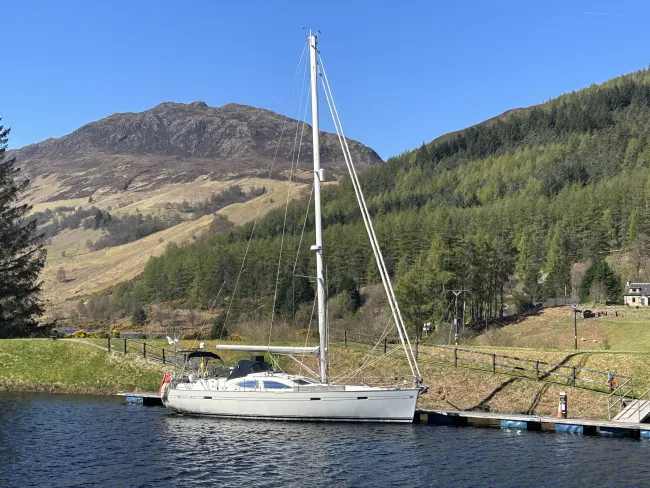 Anthony Purcell's yacht Triple D moored with a mountain in the background