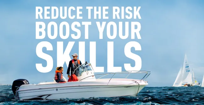Boats at sea with safety message to reduce the risk and boost your skills