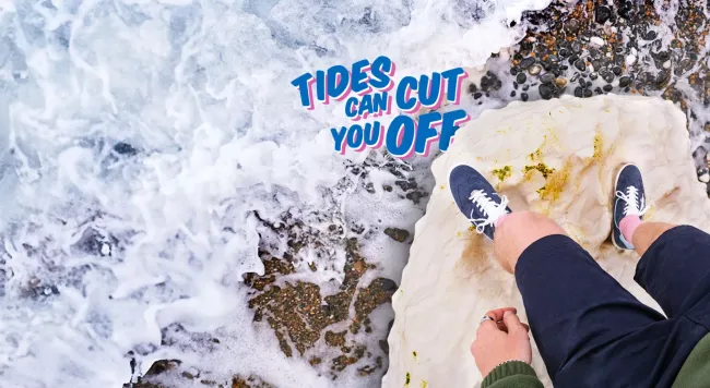 Coast Clever campaign imagery; two feet stand on a rock ledge above rapidly rising tidal waters. Text states: "Tides can cut you off". 