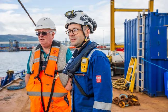 An MCA Surveyor conducts activities aboard a vessel at Belfast.